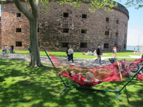 People walking aroung Governors Island attraction, Castle Williams