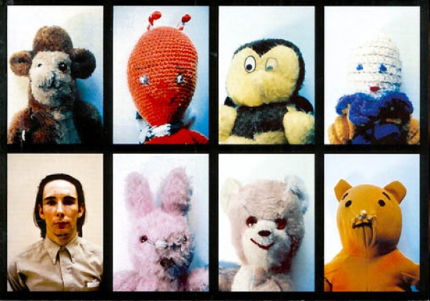 A photo stitch of Mike Kelly portraits, including several stuffed animals, a bear, a bunny, a bee and more