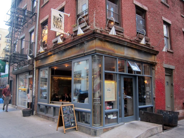 Exterior view of Back Forty West, a red brick building in SoHo