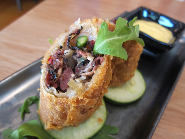Red Farm pastrami egg roll dish, with pastrami and vegetable served in a crunchy egg roll shell