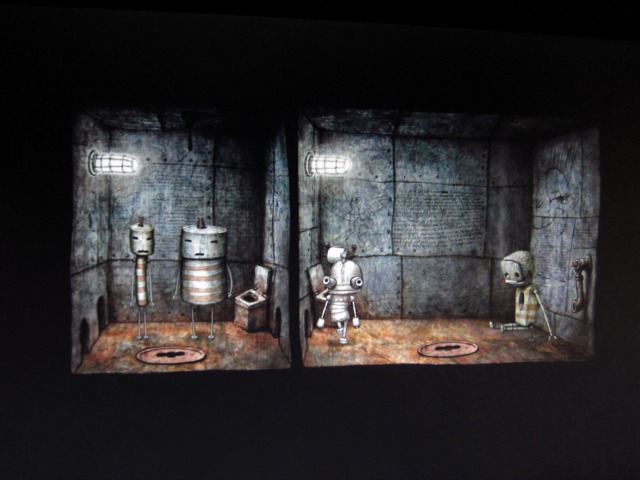 Image of the cartoony stream punk puzzler Machinarium, a video game with robots at the Museum of Moving Images