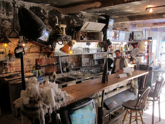 The cafe at Hauser & Wirth filled with antique looking pieces
