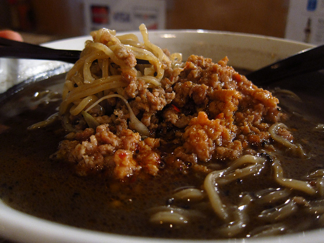 A bowl of Tabata Noodles ramen dish with lathered in sauce