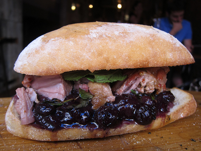 Black Tree's Summer Pig Sandwich on a large roll with lettuce