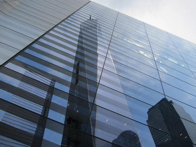 The reflection of the new One World Trade Center building in NYC.