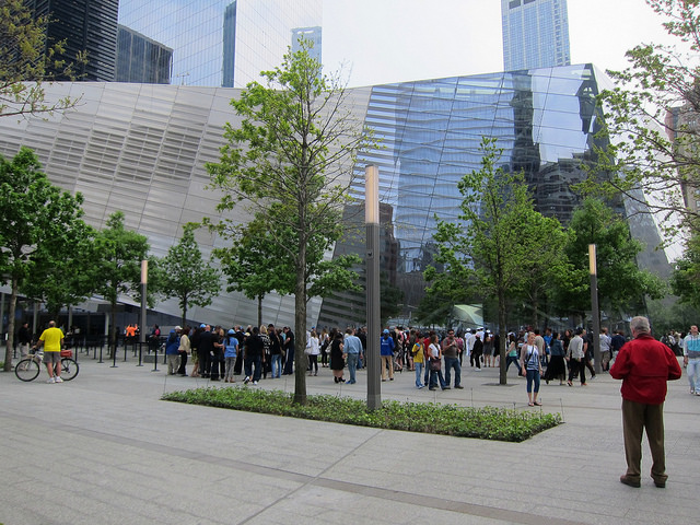 Visitors in front of the 9/11 Memorial line up to buy museum tickets.