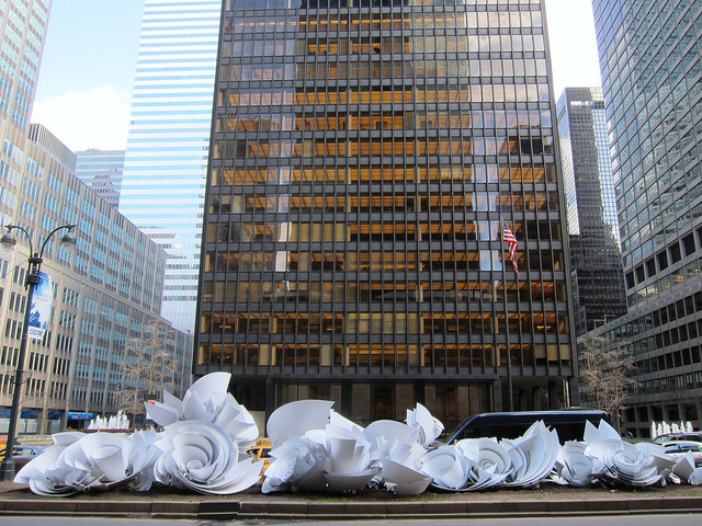 From a distance, this image shows Alice Aycock's metal folding, swirling sculptures inspired by maelstorm on Park Avenue in NYC
