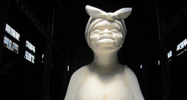 Kara Walker's enormous sphinx, 75 feet long, 35 feet high, and covered in four tons of white sugar.