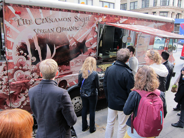 Patrons gathered outside The Cinnamon Snail food truck in Manhattan