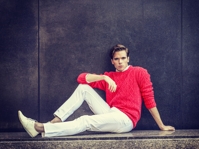 Male model wearing white trousers